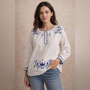 White Blouse with Blue Embroidery